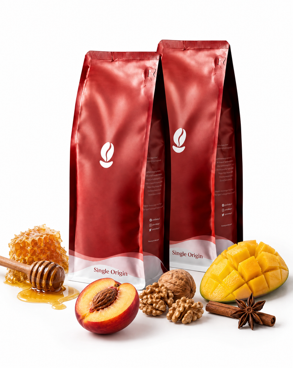 Liberica Duo, Single Origin: two red Bean Shipper Single Origin coffee bags with honeycomb, a honey dipper, nectarine, walnuts, mango, cinnamon and star anise